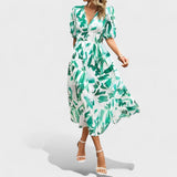 Clara – Elegantna cvetlična midi obleka