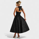 Julieta – Midi obleka s halter izrezom" could be rewritten as "Julieta – Midi obleka s halter vratnim izrezom.