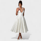 Julieta – Midi obleka s halter izrezom" could be rewritten as "Julieta – Midi obleka s halter vratnim izrezom.