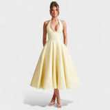 Julieta – Midi obleka s halter izrezom" could be rewritten as "Julieta – Midi obleka s halter vratnim izrezom.